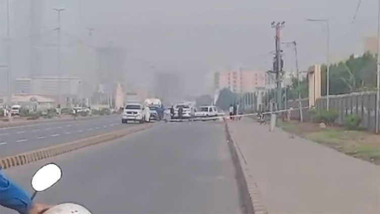 Oil spilled from Pakistan Refinery's pipeline at service road of Karachi