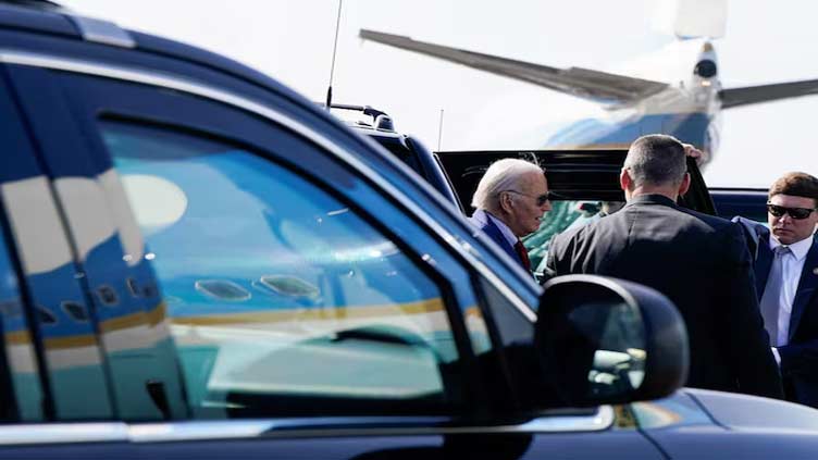 Biden makes no comment on son's pardon in Cape Verde stopover on way to Angola