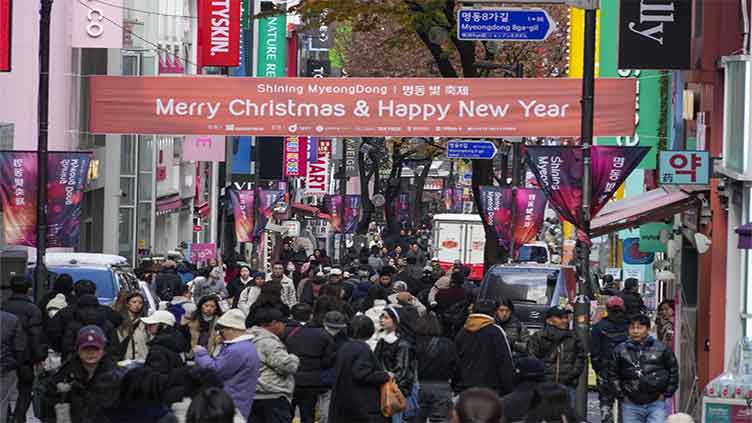 South Korea's central bank cuts key interest rate to nurse a slower economy