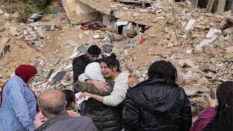 Family returns to their Lebanese city to find a crater where their 50-year-old home once stood