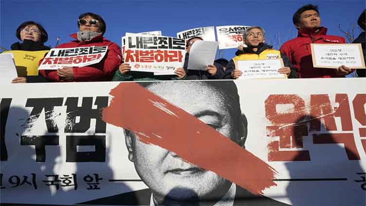 South Korea's opposition parties submit a motion to impeach President Yoon over sudden martial law