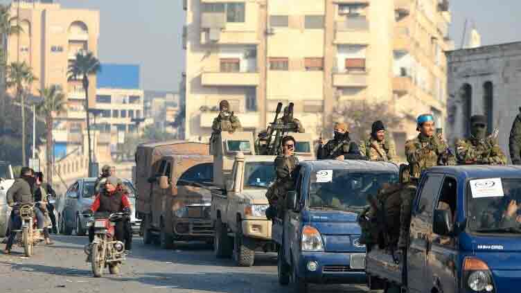 Syrian rebel assault widens as Assad races to defend Homs, Damascus