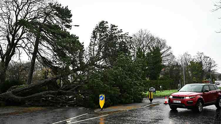 Power cuts and train cancellations as Storm Darragh batters UK