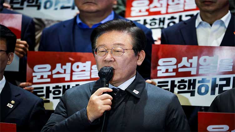 South Korea opposition leader urges president's party to support impeachment over martial law