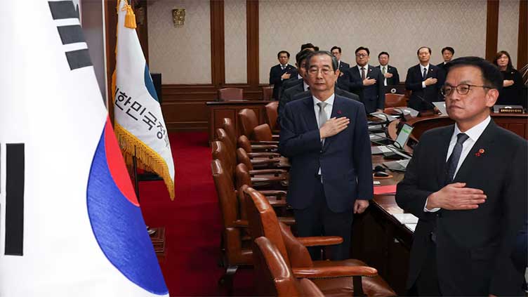 South Korea's acting president moves to reassure allies, calm markets after impeachment