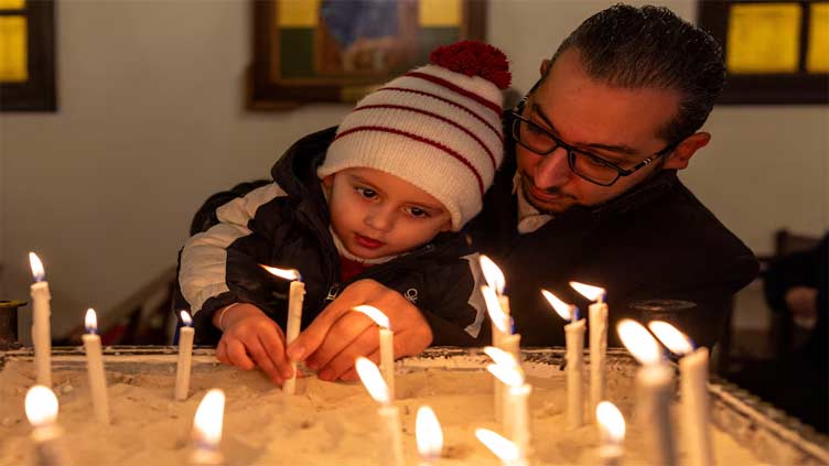 Hoping for religious harmony, Christians in a Syrian town attend Mass