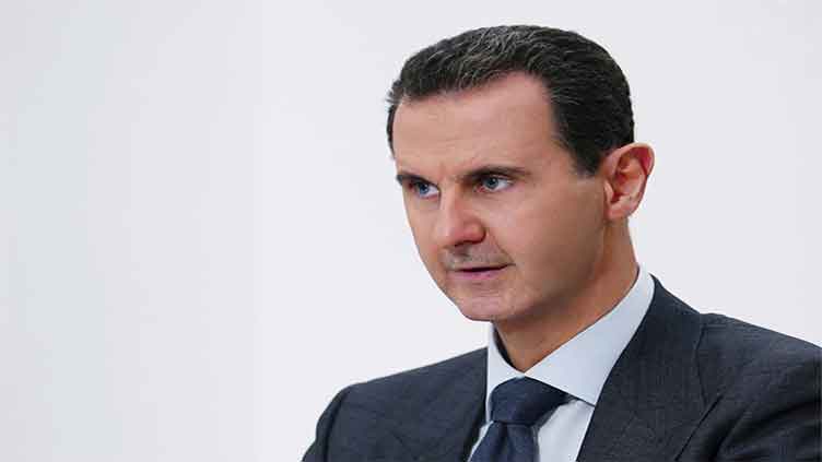 Assad says he had no plans to leave Syria but was evacuated by Russians