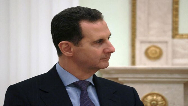 Assad denies 'planned' exit from Syria, calls new leaders 'terrorists'