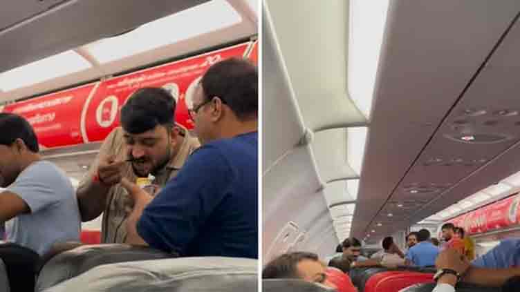 Indians on Thailand-bound flight stand, indulge in chit-chat mid-air despite air hostess request