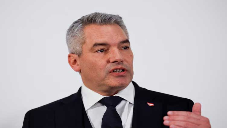 Austria says it is reviewing the status of Syrian refugees