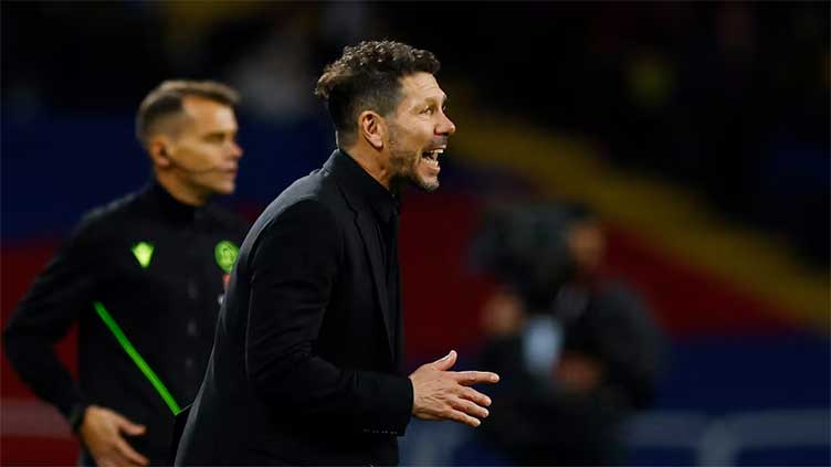 Atletico's Simeone praises team's resilience in his first win at Barca