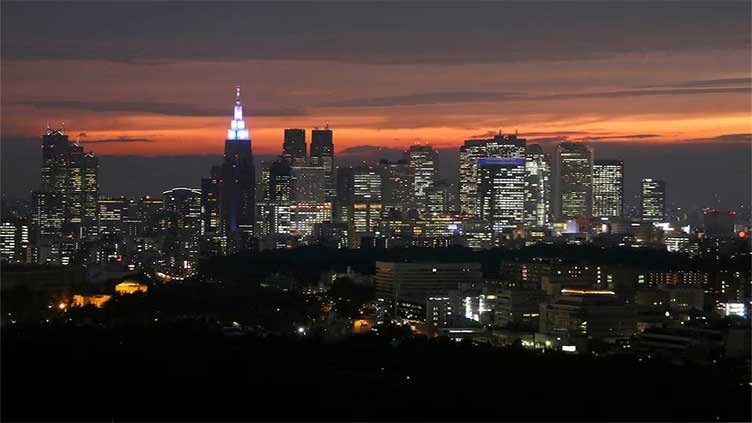 Japan's budget to hit record, but with reduced new bond issuance, draft shows