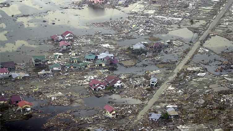 Prayers and tears mark 20 years since the Indian Ocean tsunami that killed some 230,000 people