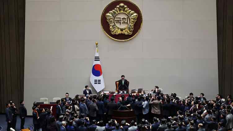 South Korea's acting president Han Duck-Soo impeached as Yoon goes on trial