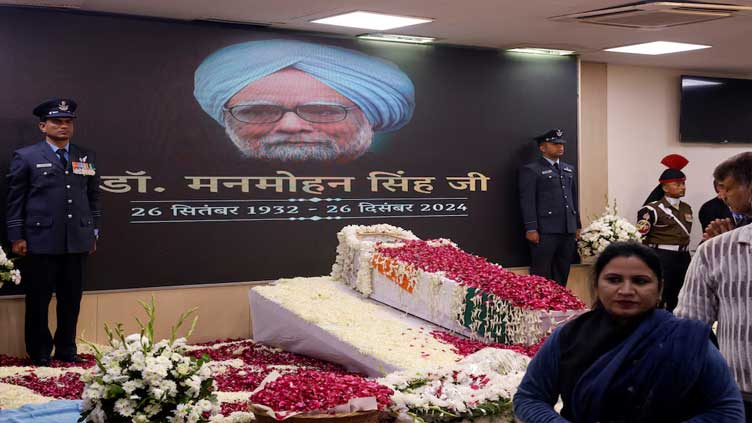 India's former PM Manmohan Singh cremated with state honours