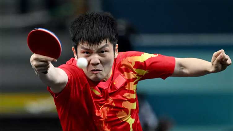 Olympic table tennis champ says never 'officially informed' about fines