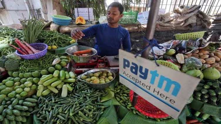 India's Paytm plunges 20%