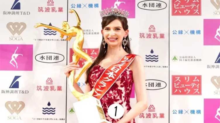 Miss Japan gives up her crown over affair with married man