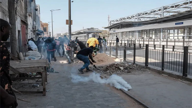 Senegal protesters clash with security forces over presidential election delay