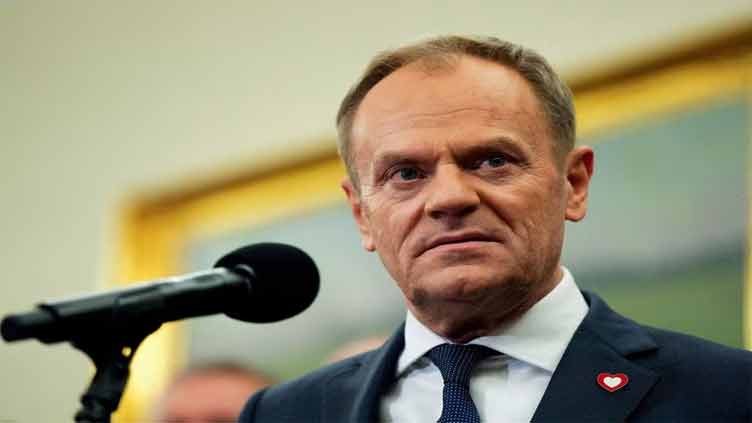 Poland's Tusk visits Paris, Berlin, as security concerns loom large