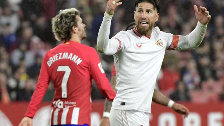 Lowly Sevilla deal Atletico blow in Liga title race