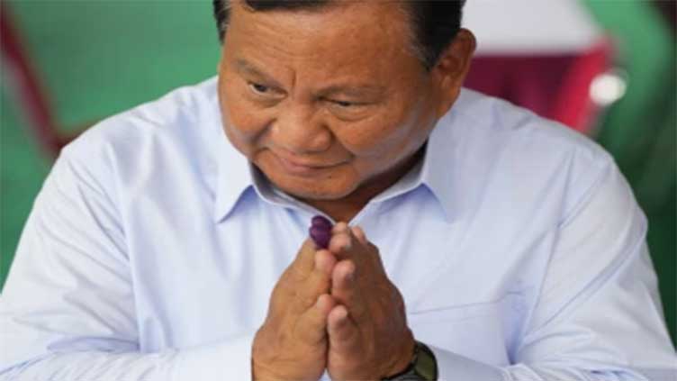 Former general holds strong lead in early, unofficial counts of Indonesia's presidential race
