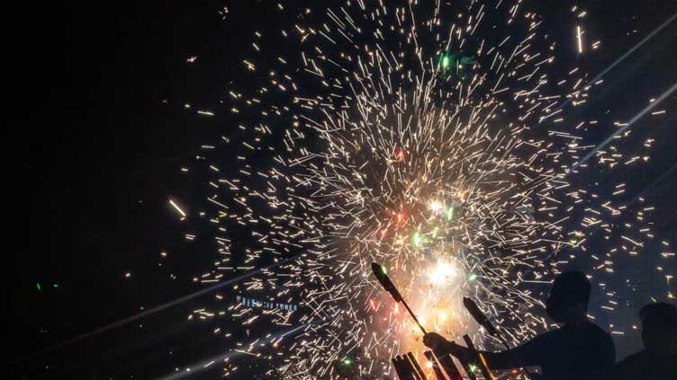 Macau's firecracker free-for-all sparks joy for New Year celebrants
