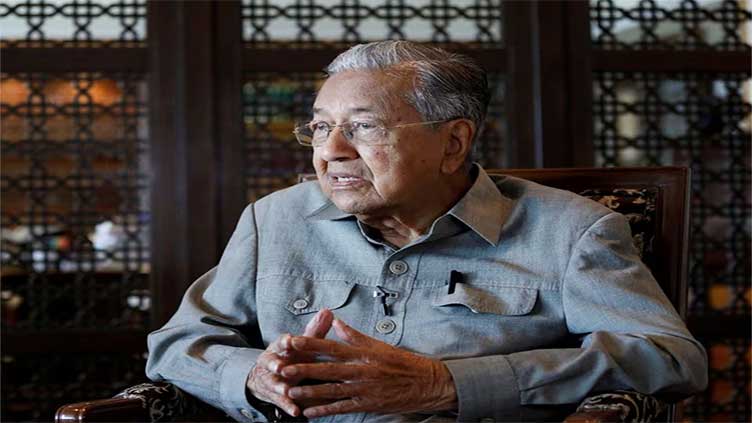 Malaysia's ex-PM Mahathir still in hospital, recovering from infection