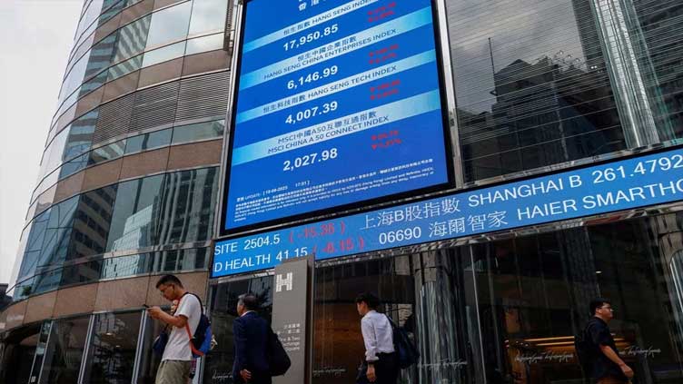 European, Japanese shares hover close to record highs
