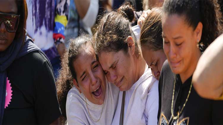 Families bid farewell to miners killed in Venezuela's worst mining accident in years