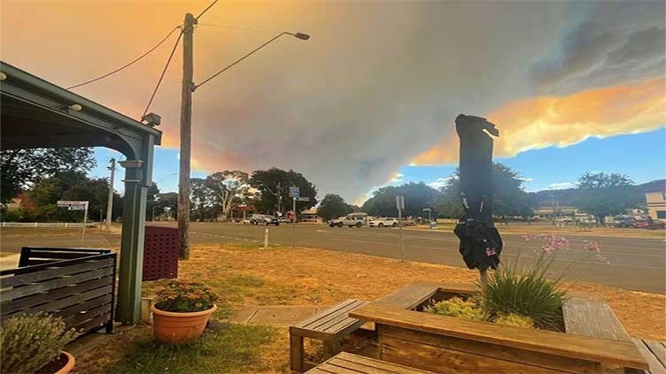 Australia PM pledges 'whatever support' needed as wild fires destroy homes