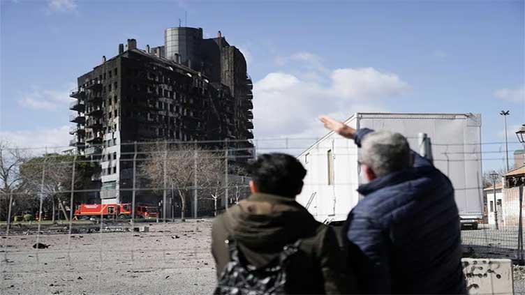 Huge apartment block fire in Spain kills nine