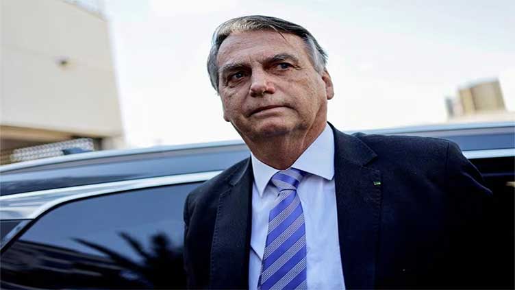 Brazil's Bolsonaro gathers supporters in show of strength amid coup probe