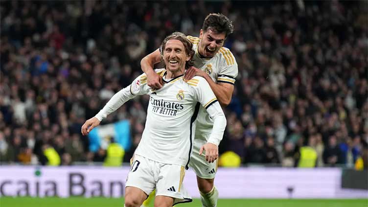 Modric thunderbolt breaks Sevilla hearts as Madrid win again