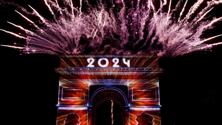 In pictures: Fireworks, weapons light skies across the world in first hours of 2024
