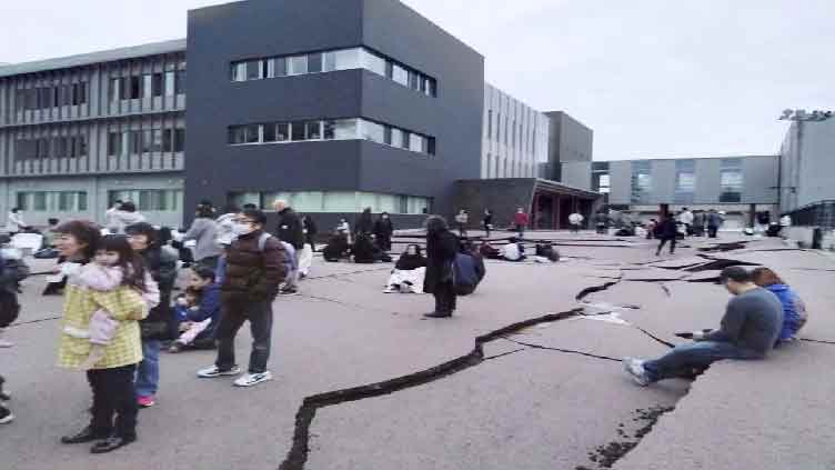 Powerful earthquake slams Japan, residents flee some coastal areas