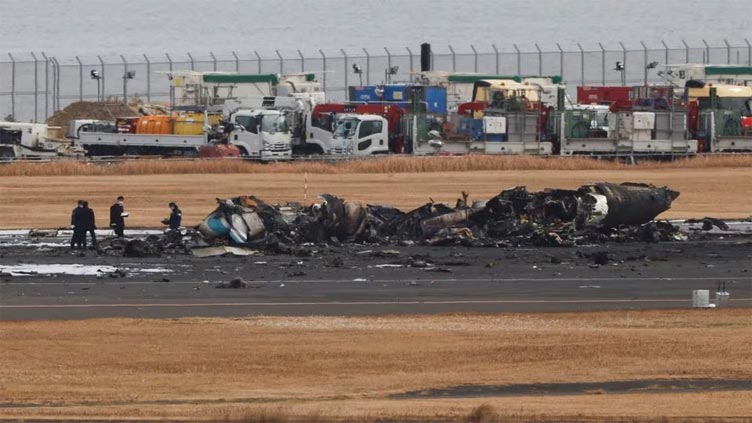 Police probe possible negligence in Tokyo runway collision