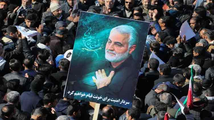 More than 100 killed in 'terrorist attacks' near tomb of Iranian Guards' Soleimani