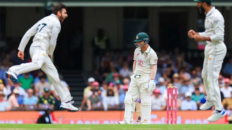 Warner gets another reprieve on rain-hit second day