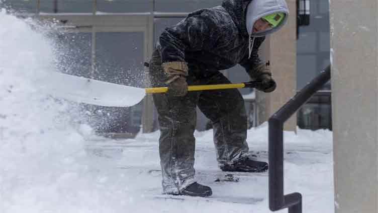 Winter weather dumps snow on US Midwest and threatens East Coast with flooding