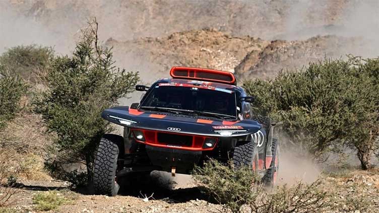 Loeb keeps tabs with Dakar leader Sainz