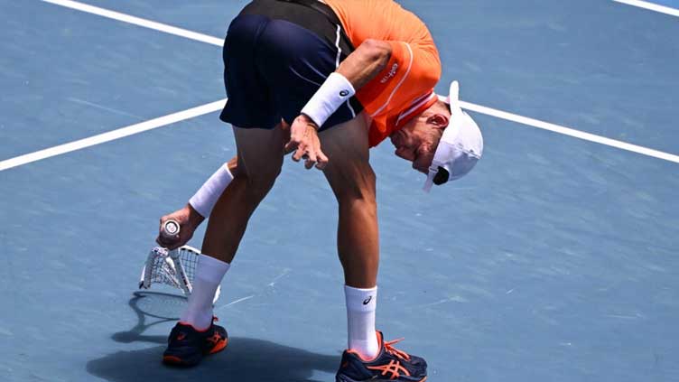 Cramps and tears as Medvedev beats brutal heat at Australian Open