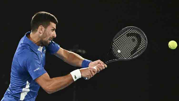 Djokovic confronts heckler as he battles through at Australian Open