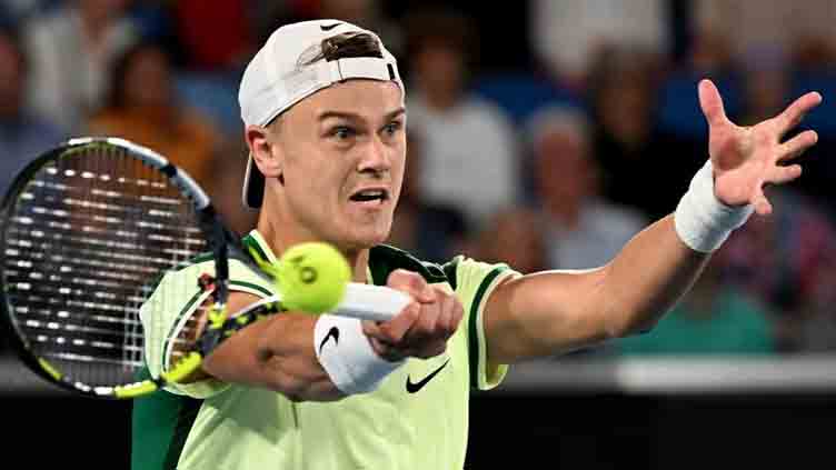 Rune bounced out of Australian Open by wildcard Cazaux