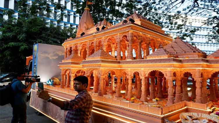 Indian devotees splurge on jets, gold idols as Hindu temple opens