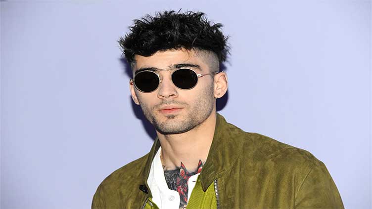 Zayn Malik says his 'foot is fine' after getting run over by a car in Paris