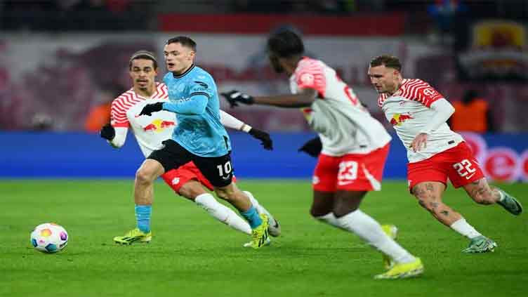 Leverkusen snatches victory at Leipzig, Dortmund cruise past Cologne