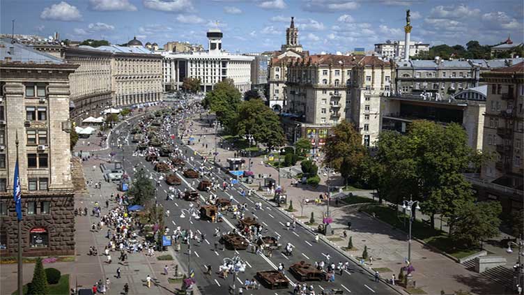 At least 25 dead in a shelling of a market in Russian-occupied Ukraine, officials report