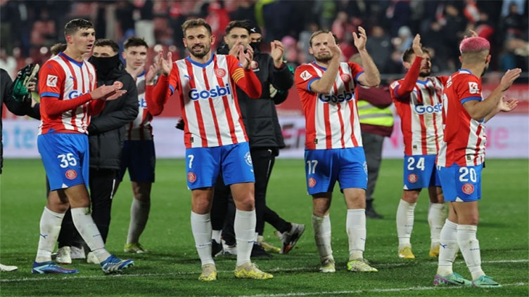 Rampant Girona keep Liga lead, Madrid and Barca triumph