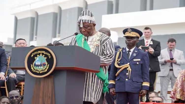 Liberia President helped away from podium during inauguration